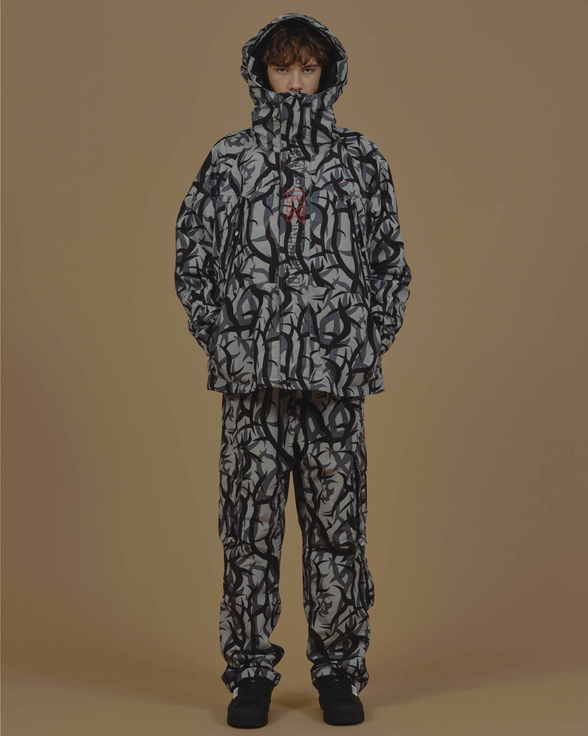 TRIAL CAMO SNOWBOARD JACKET 83,600円 
TRIAL CAMO MULTI POCKET TRACK PANTS 39,600円