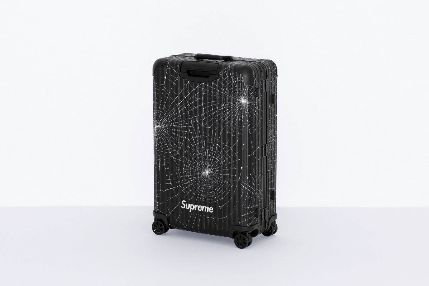 シュプリーム×リモワの限定スーツケース、スパイダー ウェブ＆ロゴ 