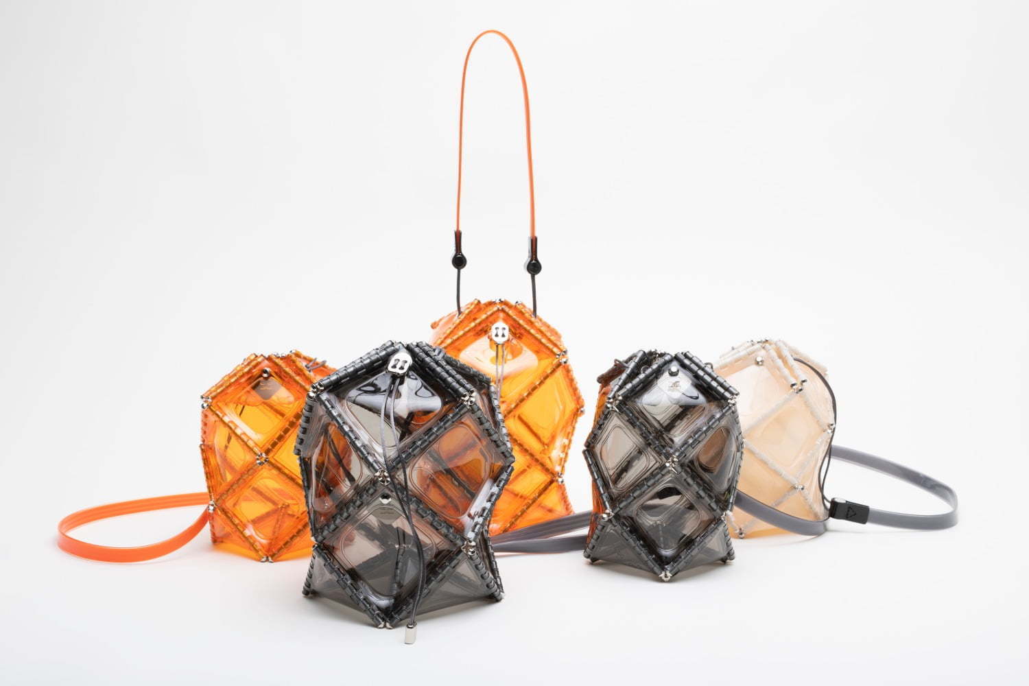 ゴジュウニ バイ ヒカルマツムラ“透明PVCバッグ”に新色オレンジ