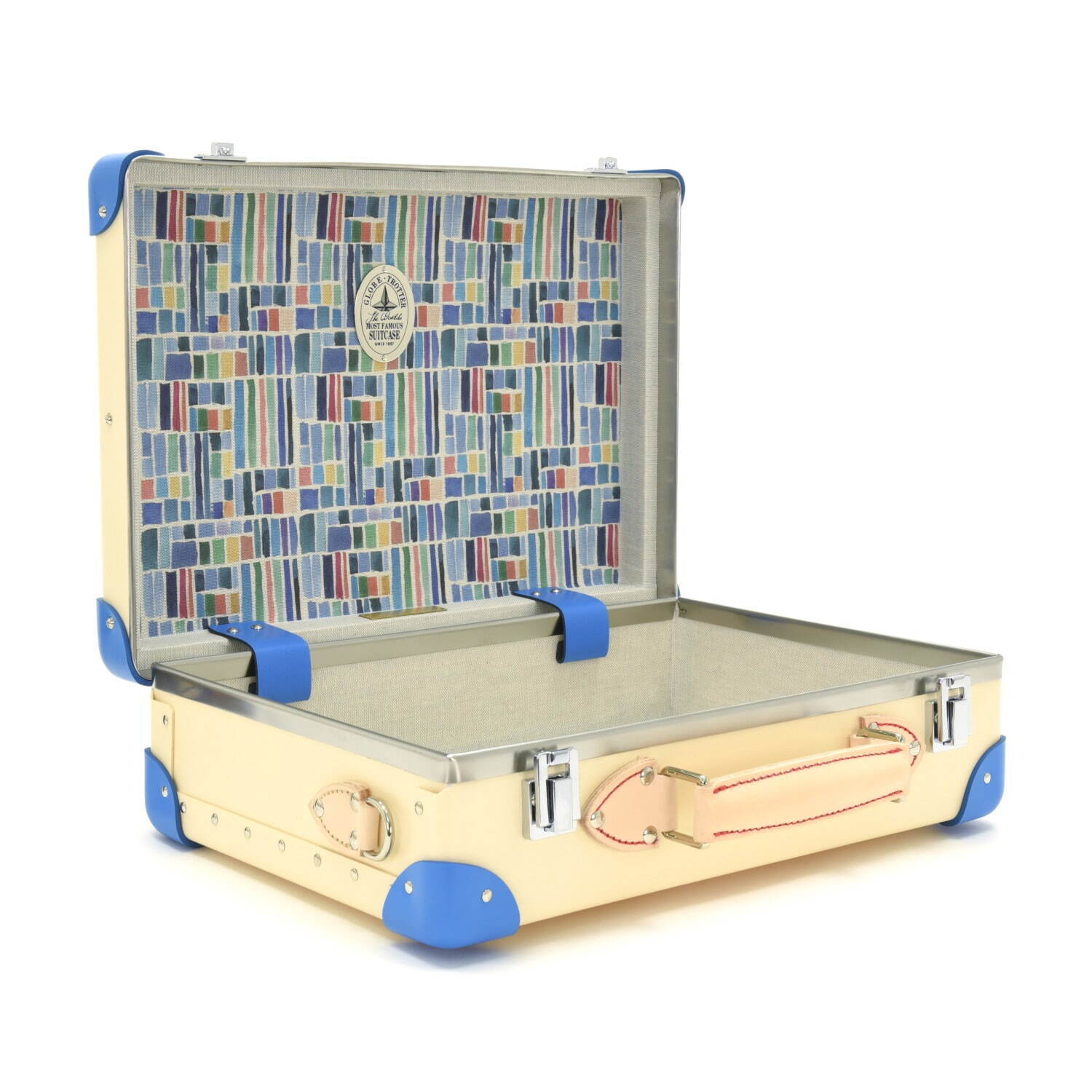 グローブ・トロッター“英国の家族旅行”着想のストライプ柄スーツケース、白い砂浜×青い海カラー｜写真6